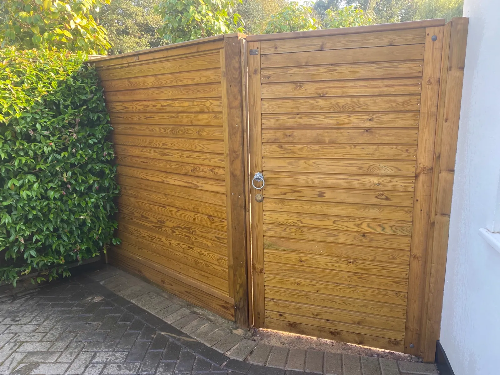 Horizontal slatted timber gate with ring latch and deadlock
